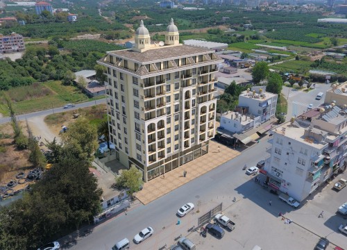 Новый комплекс с инфраструктурой в центре района Махмутлар