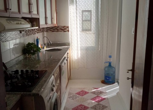 Уютная двухкомнатная квартира с отдельной кухней в районе Махмутлар