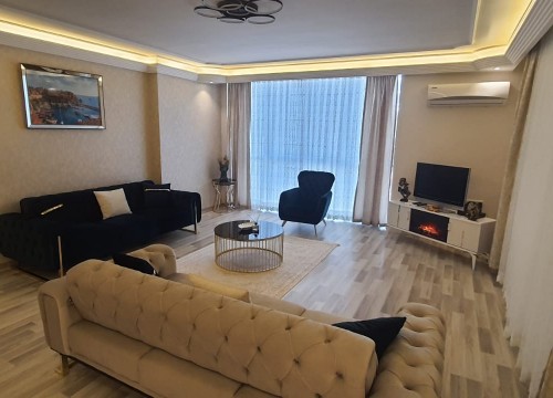 Четырехкомнатная квартира с мебелью в роскошном комплексе с большой территорией в районе Махмутлар