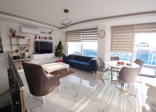 Просторная двухуровневая квартира с потрясающим видом на море в районе Махмутлар