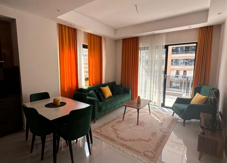Квартира 2+1 с мебелью по привлекательной цене в новом комплексе с полной инфраструктурой в районе Махмутлар